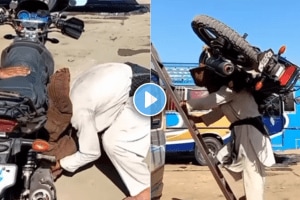 Father emotional video hardworking father picked up the bike on shoulder viral video