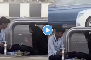 Emotional video of a couple girlfriend seating on a road with boyfriend viral video on social media