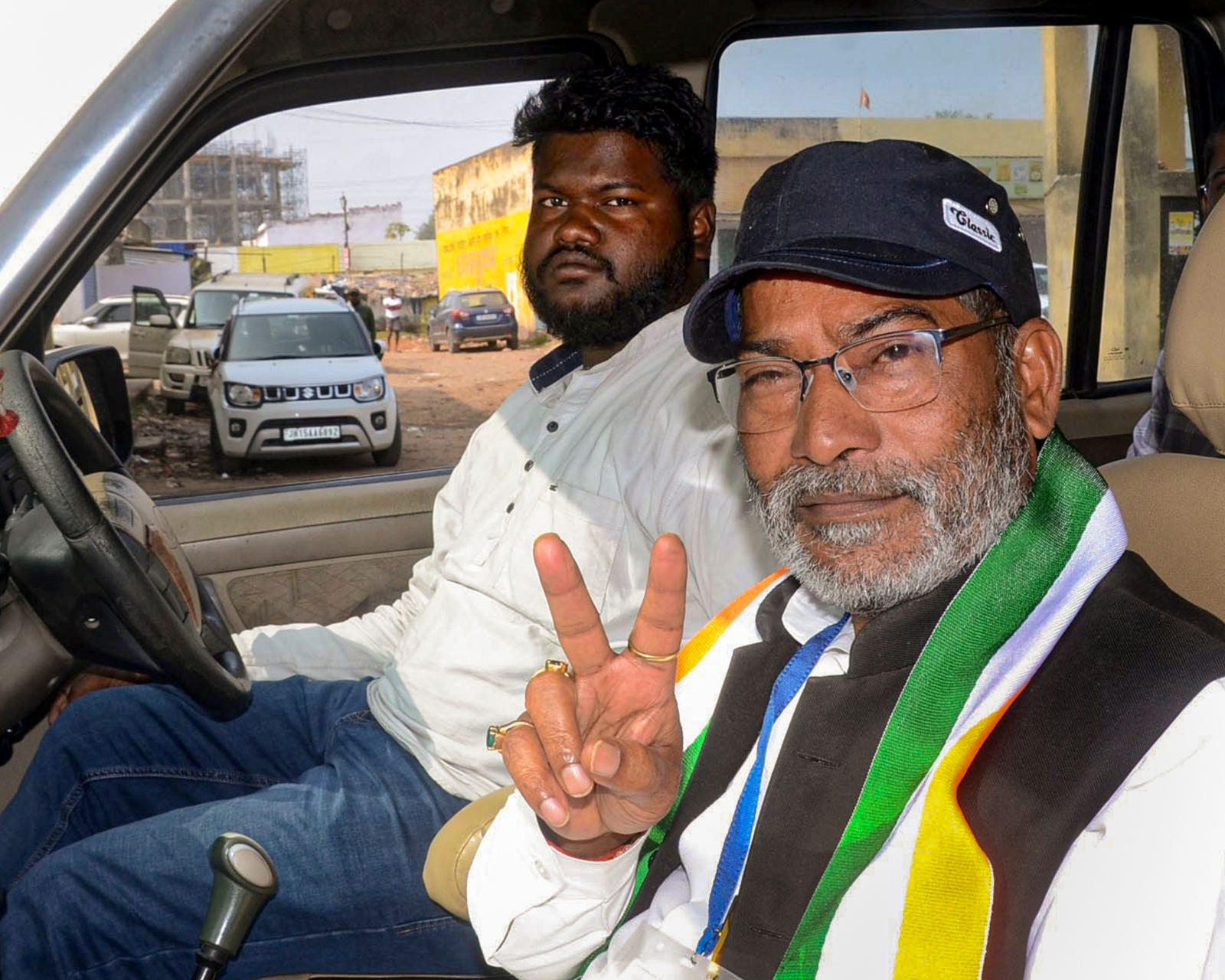 Suresh Kumar Baitha, the Congress candidate for the Kanke Assembly seat, flashes a victory sign in Ranchi following his commanding lead in the Jharkhand Assembly Election 2024. (Photo credit: PTI)