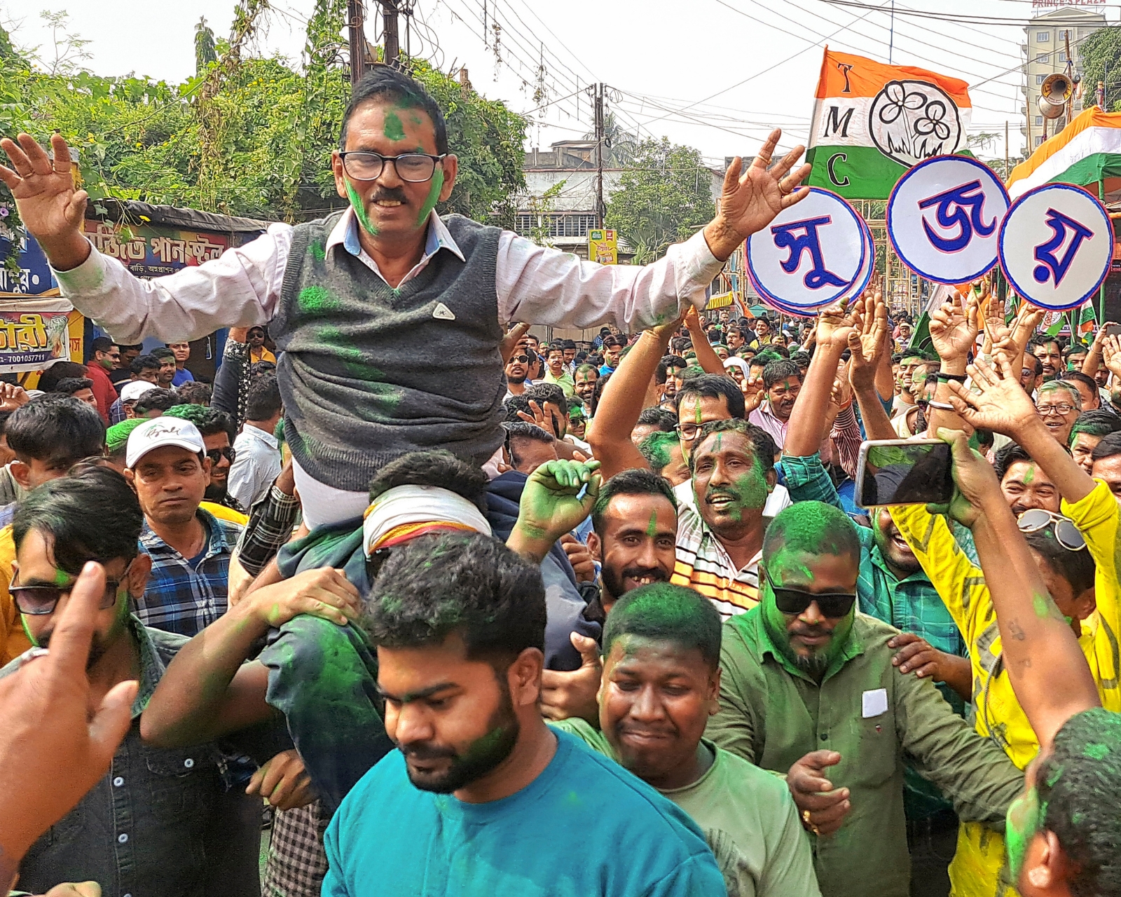 Trinamool Congress supporters celebrate party candidate Sujoy Hazra's victory in the Medinipur Sadar by-elections, in West Medinipur. (Photo credit: PTI)