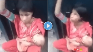 Mother travelling between two coaches with her child shocking video viral on social media