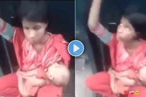 Mother travelling between two coaches with her child shocking video viral on social media