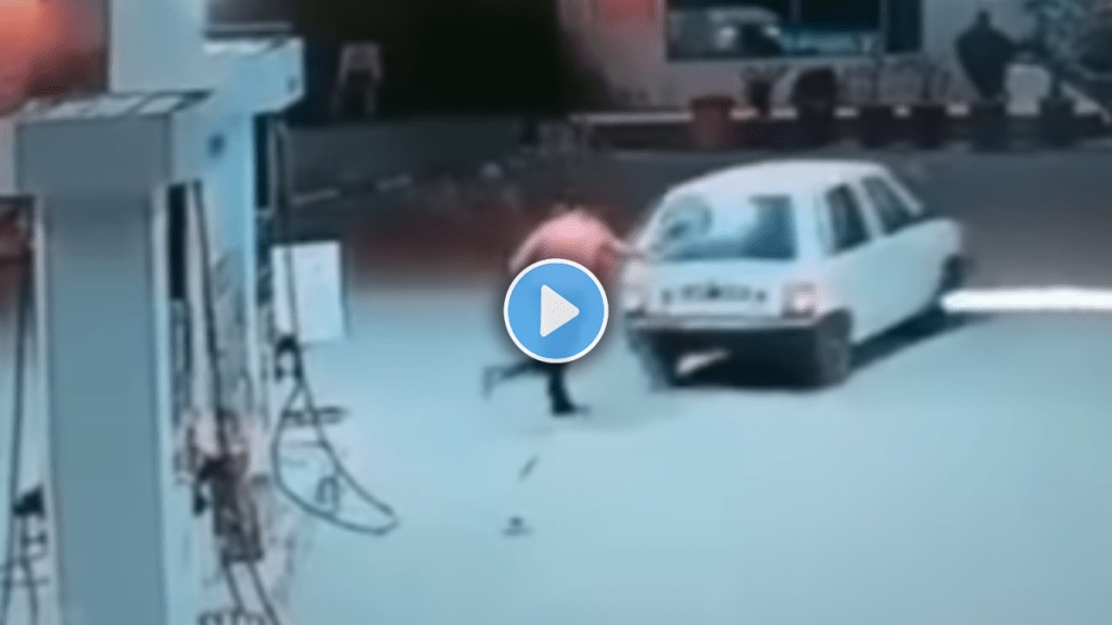 car driver ran without paying for fuel petrol pump employee broke the glass of a car viral video