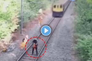 train accident man saved a life of another man who was standing on a railway track Viral video