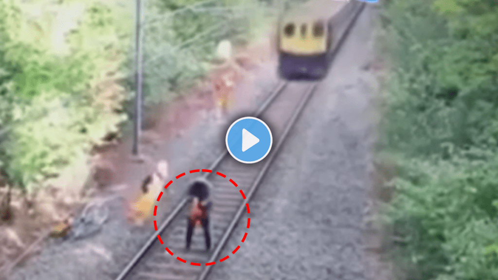 train accident man saved a life of another man who was standing on a railway track Viral video