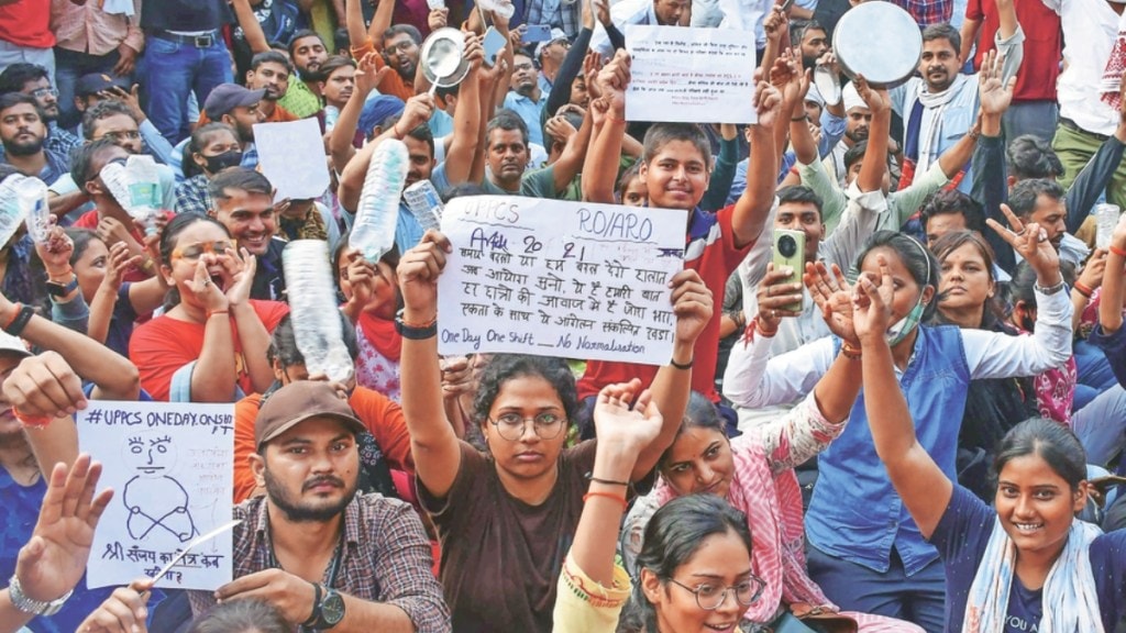 massive protest by uppsc aspirants over exam dates