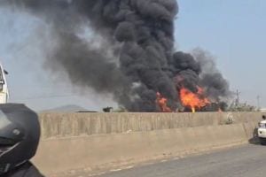 cargo vehicle caught fire on Mumbai Ahmedabad National Highway