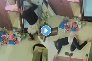 Terrifying video of a woman electrocuted while cleaning the fridge she fell down due to electric shock viral video