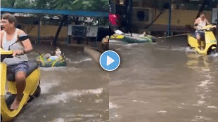 Chennai mans scooter-raft ride with grandchildren in flooded complex Viral video