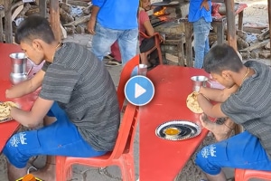 emotional video Disabled young man tried hard to eat one bite of food viral video on social media