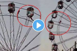 Shocking video young woman lost her balance while setting in giant wheel and fell and got caught on an iron angle in lakhimpur uttar Pradesh