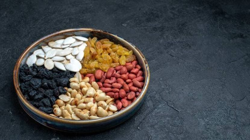 Eating dried fruits in water 