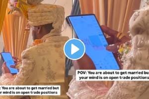 Funny video groom busy watching share market trading in wedding ceremony video goes viral