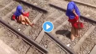 Shocking Viral video young girld fall on railway track while talking on phone with boyfriend video goes viral