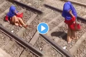 Shocking Viral video young girld fall on railway track while talking on phone with boyfriend video goes viral