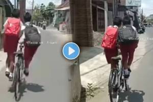 School Students Ride One bicycle