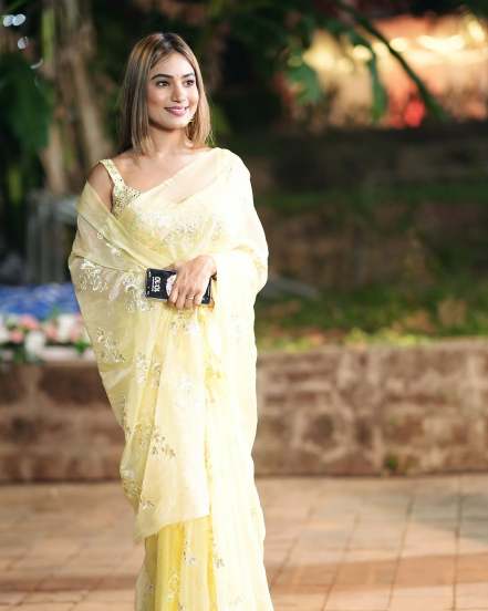 'Paaru' Fame Purva Shinde shares pictures in yellow saree for a wedding on social media