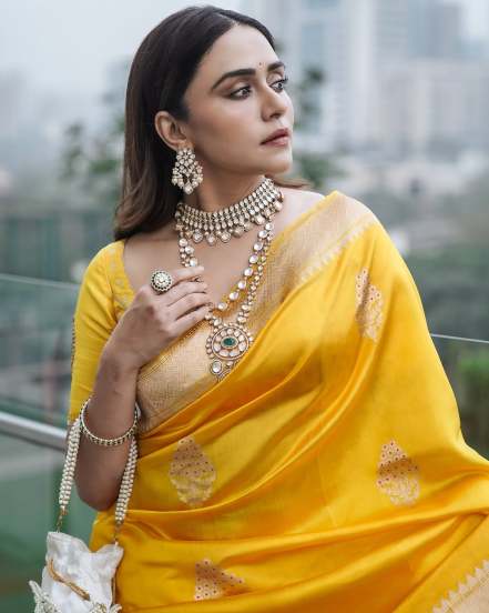 Amruta Khanvilkar shares photos in yellow Banarsi Saree on instagram