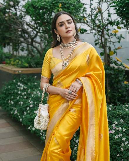 Amruta Khanvilkar shares photos in yellow Banarsi Saree on instagram