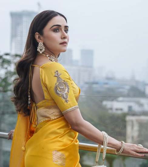 Amruta Khanvilkar shares photos in yellow Banarsi Saree on instagram