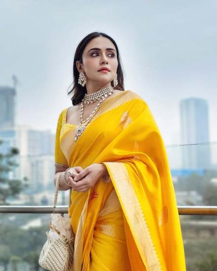 Amruta Khanvilkar shares photos in yellow Banarsi Saree on instagram