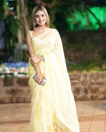 'Paaru' Fame Purva Shinde shares pictures in yellow saree for a wedding on social media