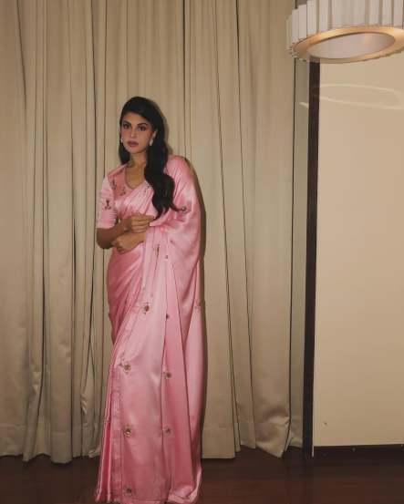 Jacqueliene Fernandez shares glamorous photos in pink silk saree on social media