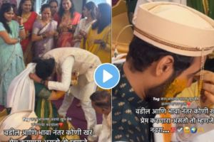 A groom breaks down in tears as he watches his bride cry