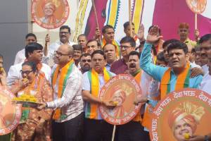 BJP office bearers celebrate as Devendra Fadnavis is elected as the Chief Minister