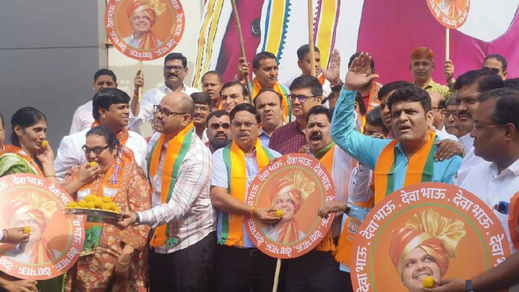 BJP office bearers celebrate as Devendra Fadnavis is elected as the Chief Minister