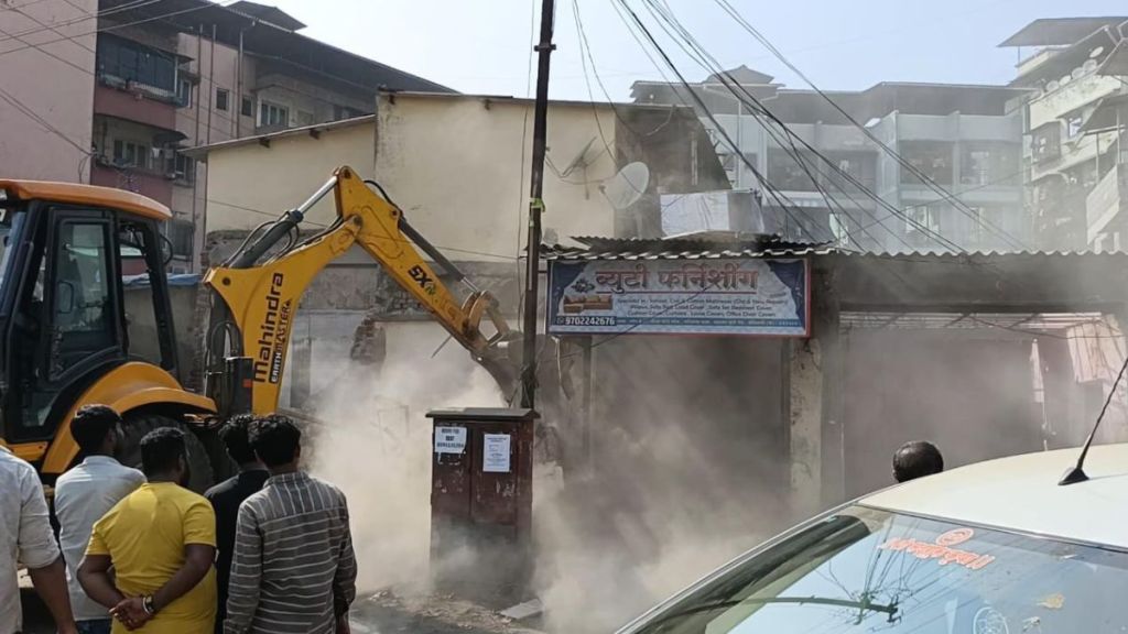 Commercial buildings demolished during cement concrete road widening at Garibacha Pada in Dombivli