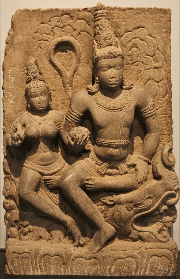 Varuna with Varunani. Statue carved out of basalt, dates back to 8th century CE, discovered in Karnataka. On display at the Prince of Wales museum, Mumbai.

