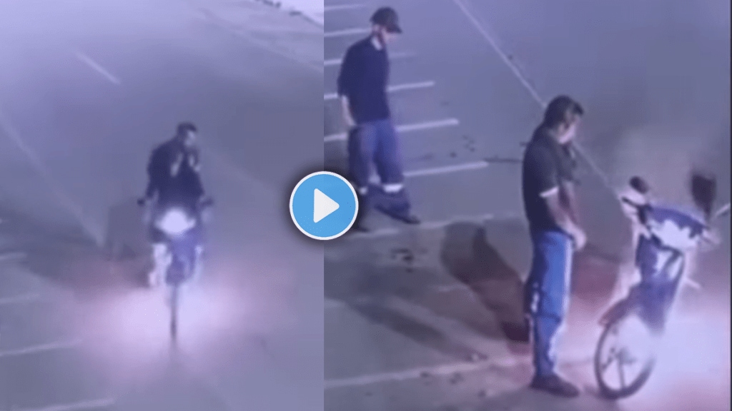 scooter caught fire man urinated on it crazy video viral on social media