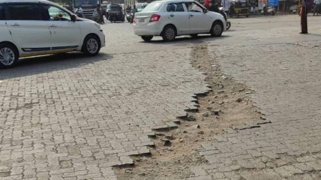 Commuters are suffering due to long potholes at Prem Auto Chowk on Murbad Road in Kalyan