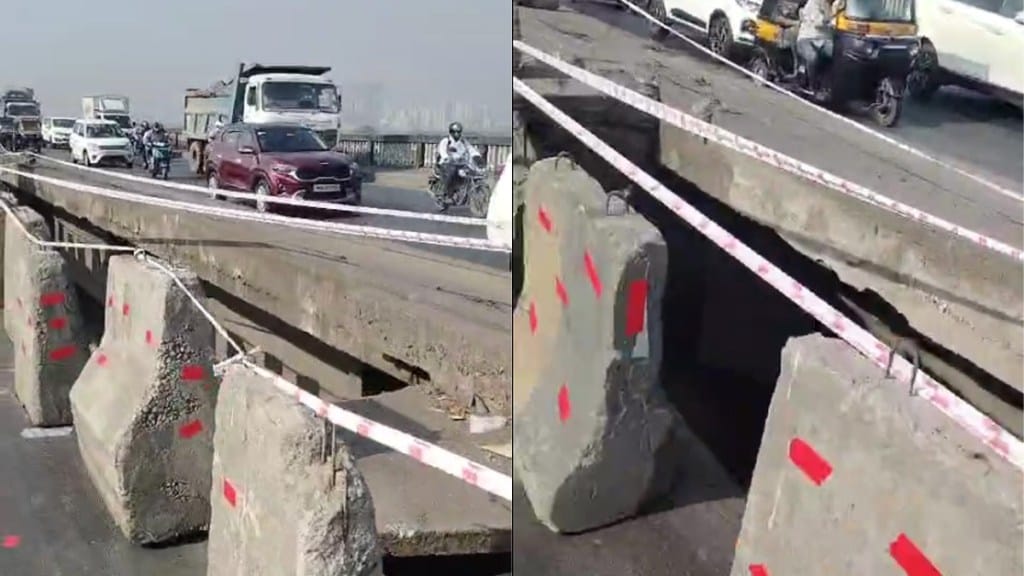 A portion of the divider bridge collapsed Kharegaon flyover