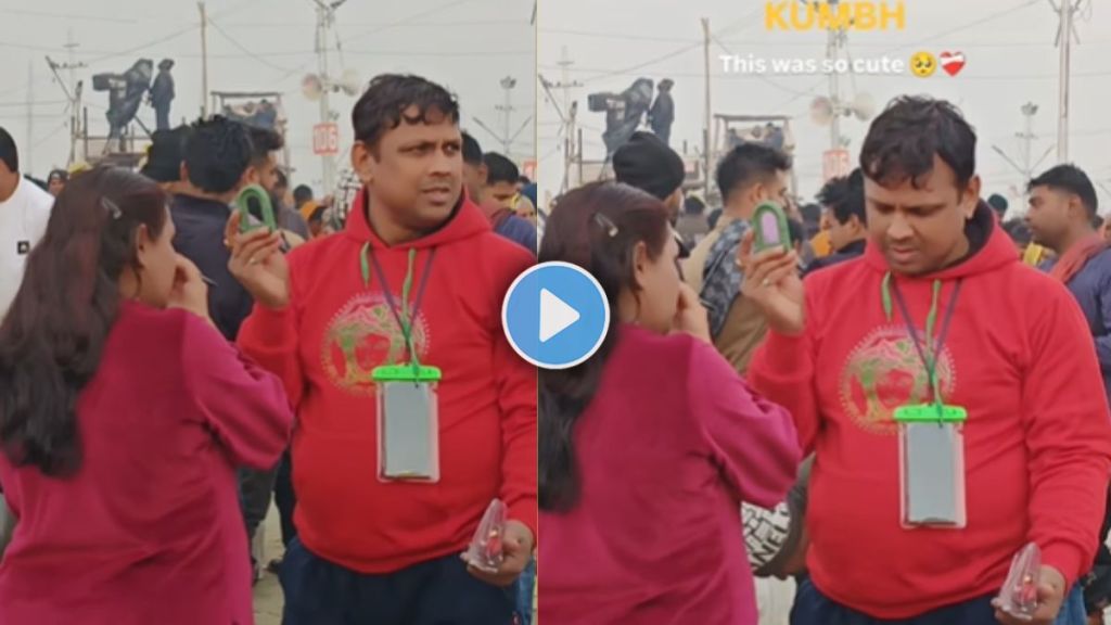 e a man holding mirror for a wife while doing makeup in mahakumbh mela