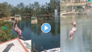 an old lady enjoying Ropeway by wearing nauwari