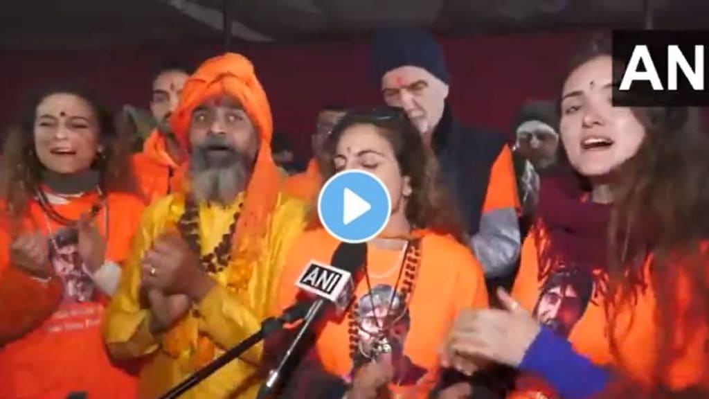 MahaKumbh Mela 2025 : A group of foreign devotees sing Om Jai Jagdish Hare bhajan