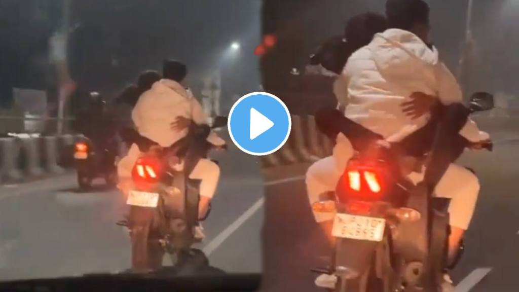 Shocking video Couple Caught On Camera Romancing While Sitting On Speeding Bike On Moradabad-Delhi Highway