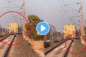 Viral video young boy sitting on railway track while talking phone video goes viral social Media