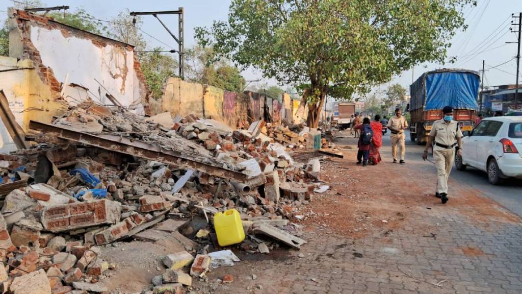 administration with Railway Security Force and local police demolished structures near Vitthalwadi station