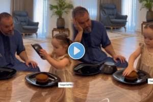 Baby Girl Sharing food with Dad