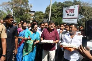 NCP leader mla jitendra awad protested with eggs in thane collector ashok shingares hall