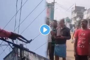 Shocking video Man Sleeps On An Electricity Pole In Andhra Pradesh Shocking Video