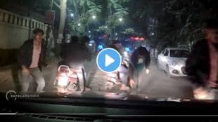 Shocking video pune A Guy in Car attacked by 3 Youths on Scooter Pune street video goes viral