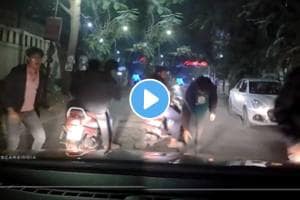 Shocking video pune A Guy in Car attacked by 3 Youths on Scooter Pune street video goes viral