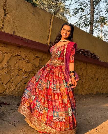 Palvi Kadam Shares pictures in Red Lehenga From The Sets of Aai Baba Retire Hot Ahe on social media