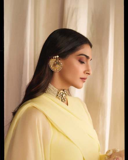 Sonam Kapoor shares pictures in yellow dress with unique jewellery on social media