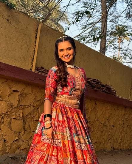 Palvi Kadam Shares pictures in Red Lehenga From The Sets of Aai Baba Retire Hot Ahe on social media