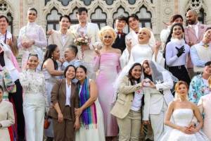 A group of LGBTQ pose for a picture as a part of celebration of a marriage equality bill at Government house in Bangkok, Thailand. (AP Photo)